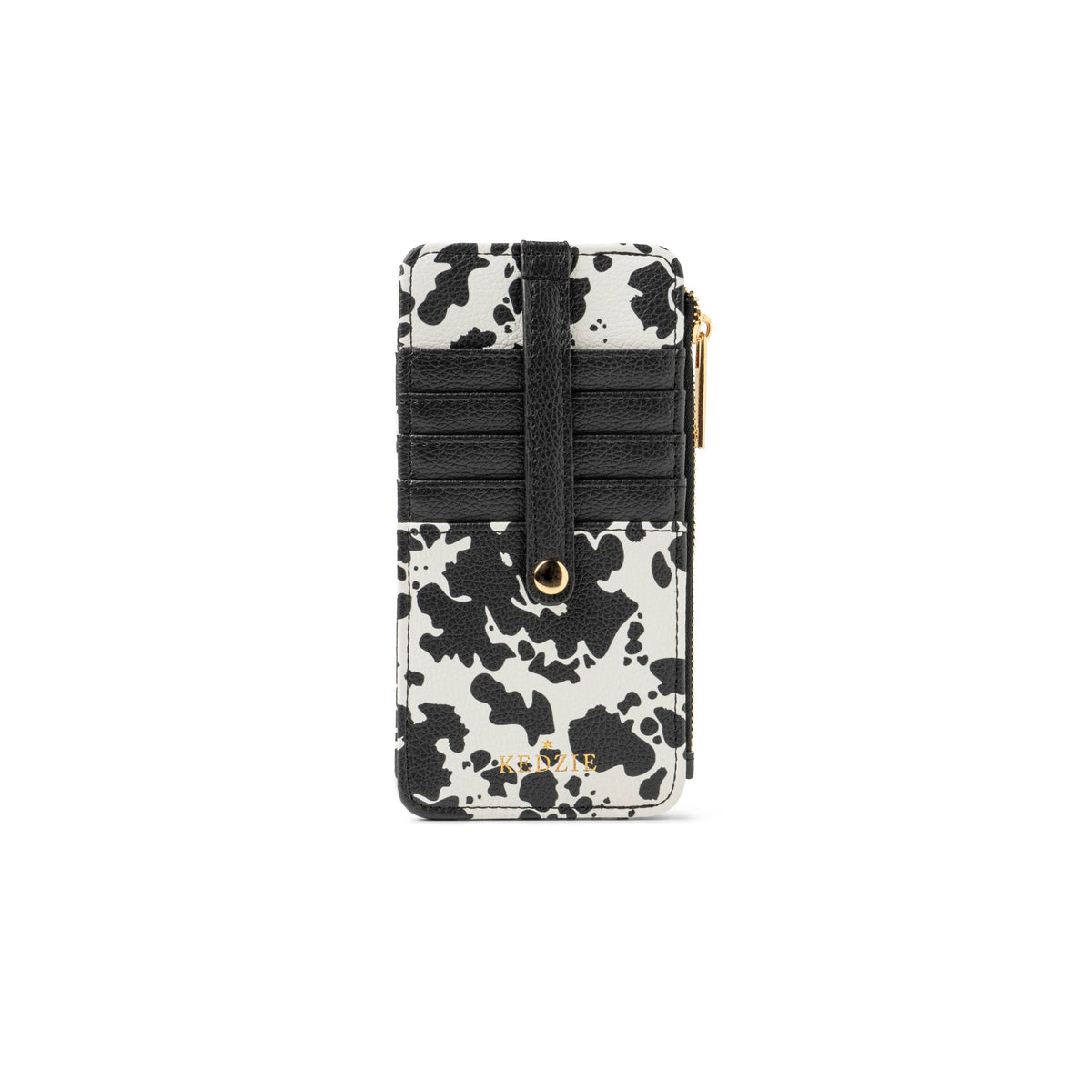 Black and white cow-print vegan leather wallet with zippered cash pocket, black strap, gold-tone details, and cheetah print lining. Sizes available: not specified.