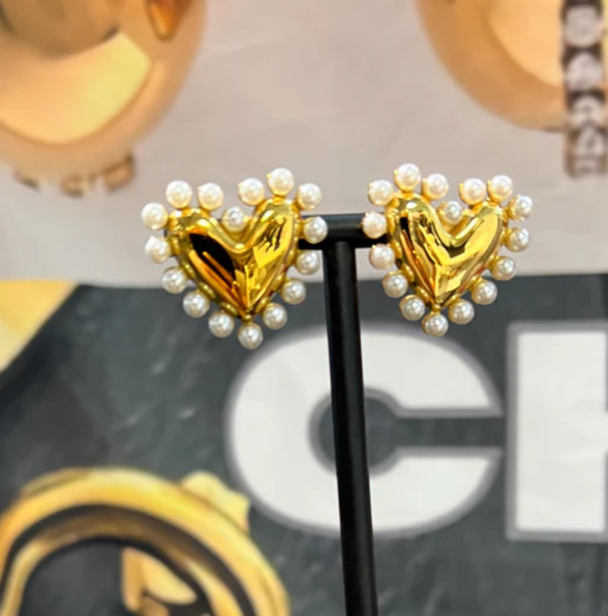 Pearl Heart Earrings: Sophisticated, golden color, outlined with small pearl-like beads. Sizes available: One size.