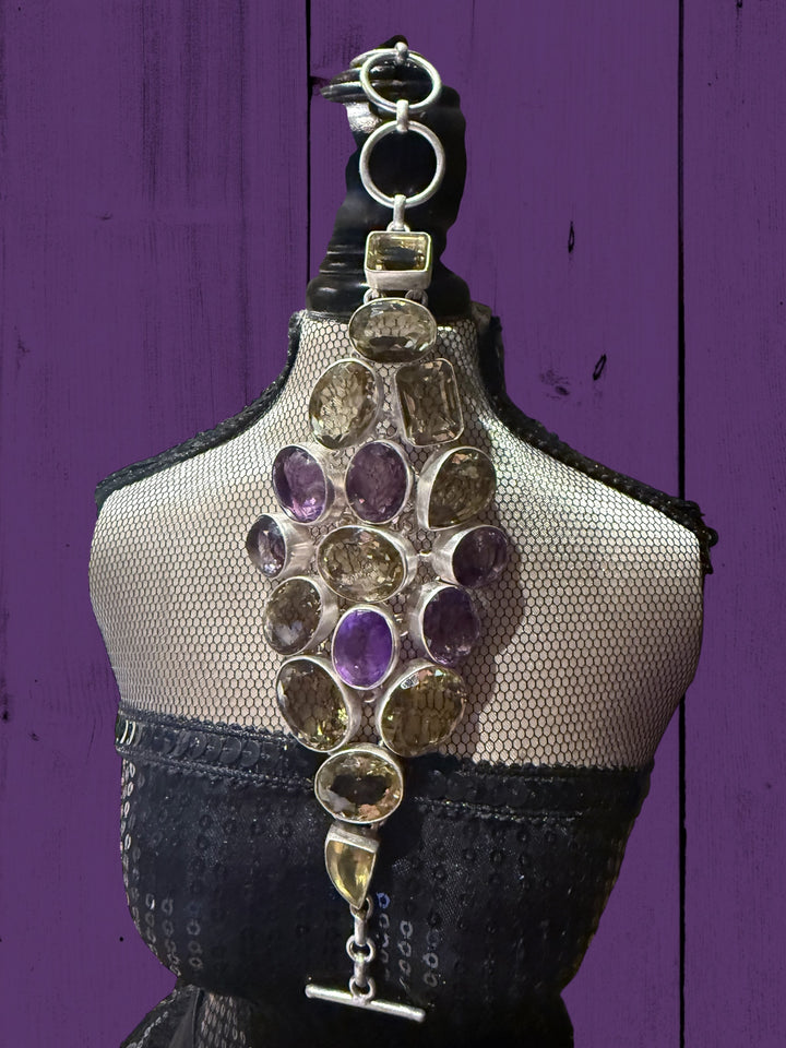 Vintage sterling silver jewelry with amethyst and citrine stones; available sizes: small, medium, large.