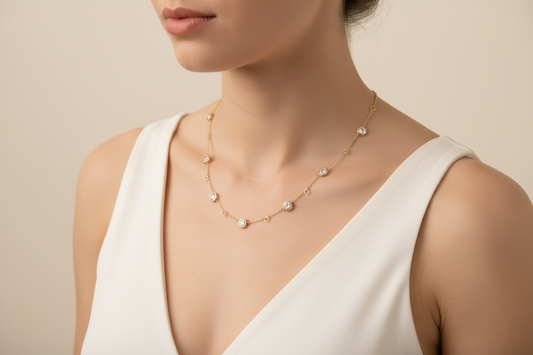 Clementine Gold Necklace with White Crystals shown; available in 16", 18", and 20" lengths.