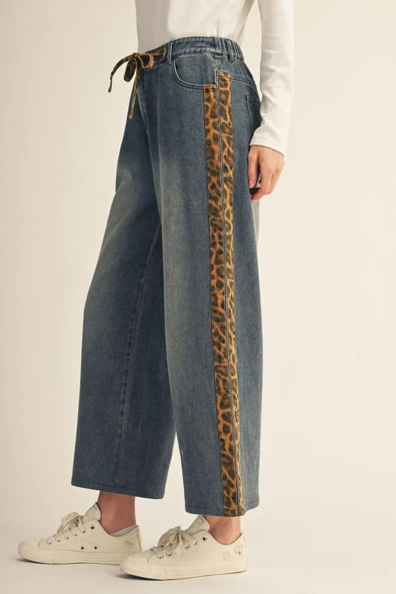 Cheetah Contrast Jeans—washed denim with bold animal-print side stripes. Available in sizes 24-32.