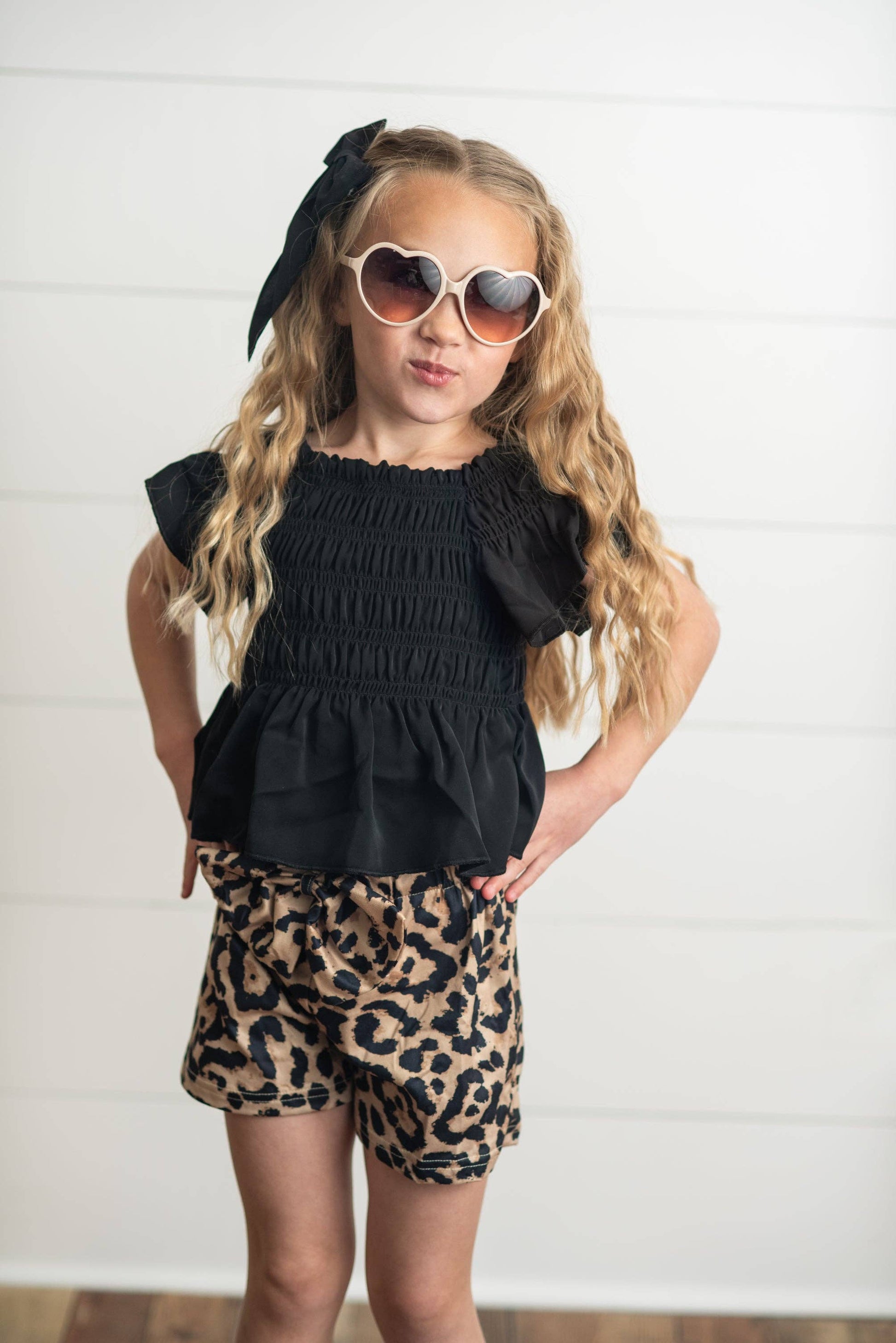 Girls Leopard Shirred Short Set in leopard print, shirred waist, available in sizes XS-XL.