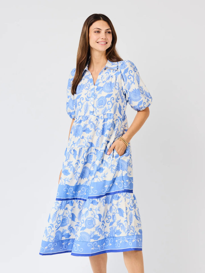 Eloise Porcelain Vines Blue Dress: white with blue vines, puff sleeves, collared neckline, tiered midi skirt, pockets. Sizes XS-XL.