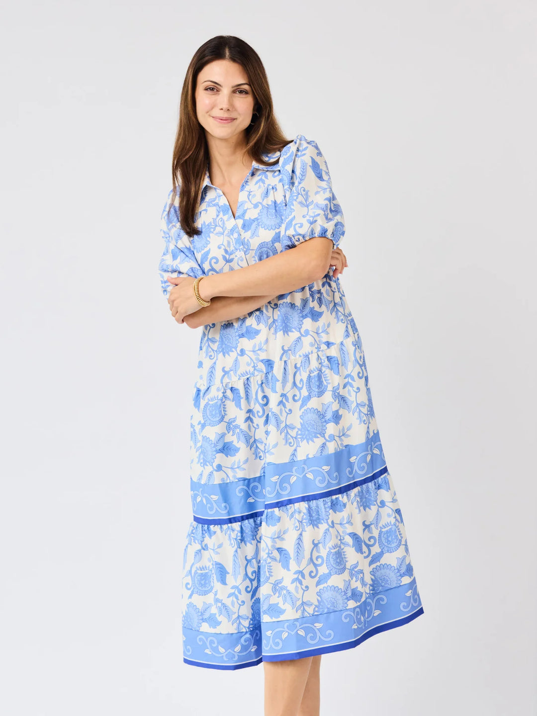 Eloise Porcelain Vines Blue Dress: white and blue floral, puff sleeves, tiered midi skirt. Sizes XS–XL.