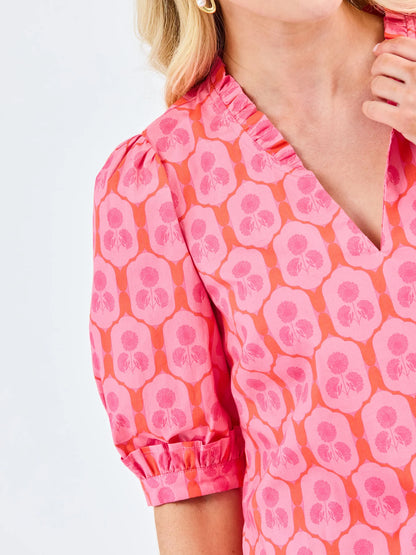 Colette Rosette Charm Pink Top with red floral pattern, short puff sleeves, V-neckline. Available in XS-XL.