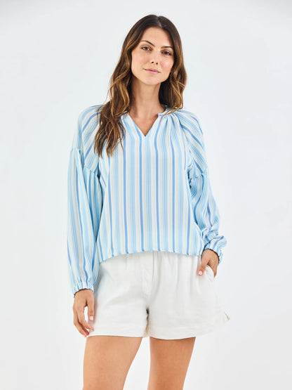 Scarlette Harbor Lines Blue Top: loose, blue-and-white striped V-neck blouse. Available in sizes XS–XL.