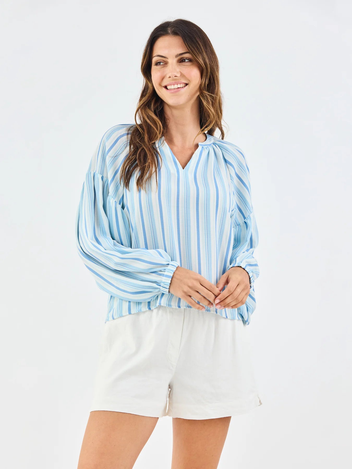 Scarlette Harbor Lines Blue Top with light blue and white stripes, V-neckline. Available in XS–XL.
