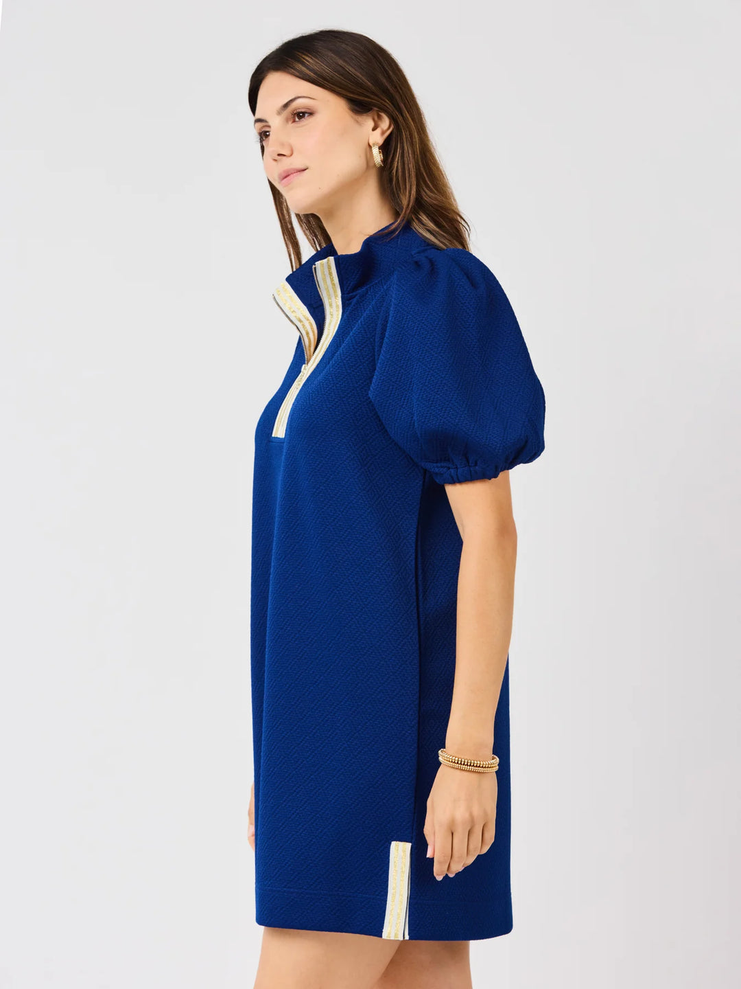 Andie Navy Dress with short puff sleeves, high collar, zip details, crosshatch jacquard. Available in sizes XS-XL.
