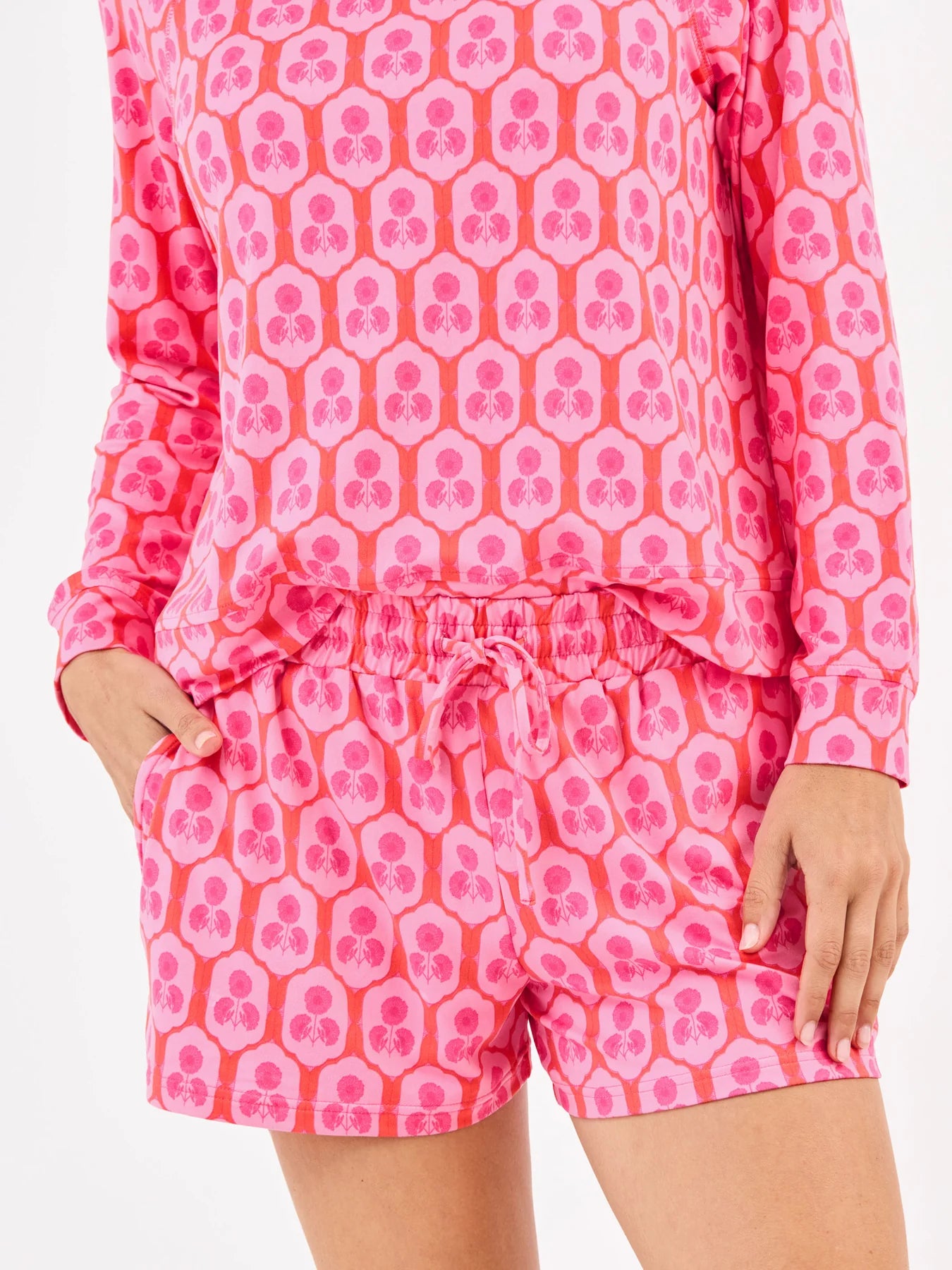 Annie Rosette Charm Pink Shorts Set: matching long-sleeve top and shorts with bold pink/red florals. Sizes XS-XL available.