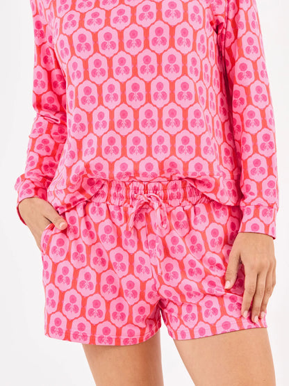 Annie Rosette Charm Pink Shorts Set: matching long-sleeve top and shorts with bold pink/red florals. Sizes XS-XL available.