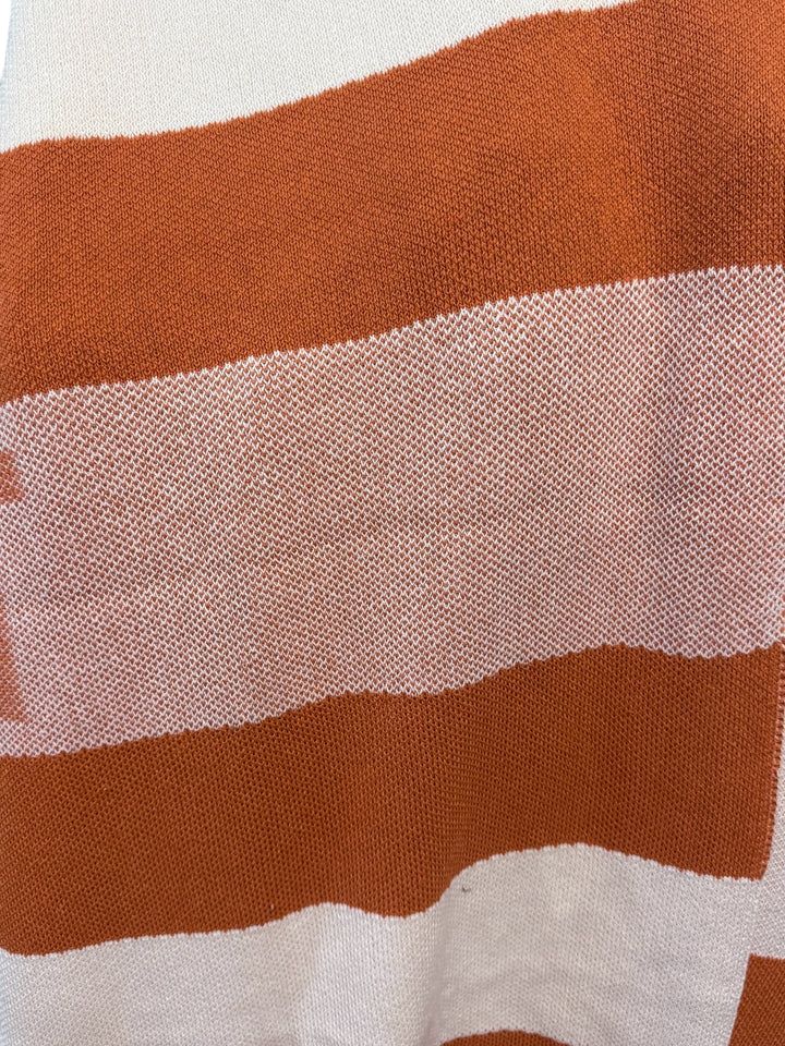 Knit Throw - Multi Stripe Texas, featuring horizontal stripes in white, burnt orange, and muted orange.