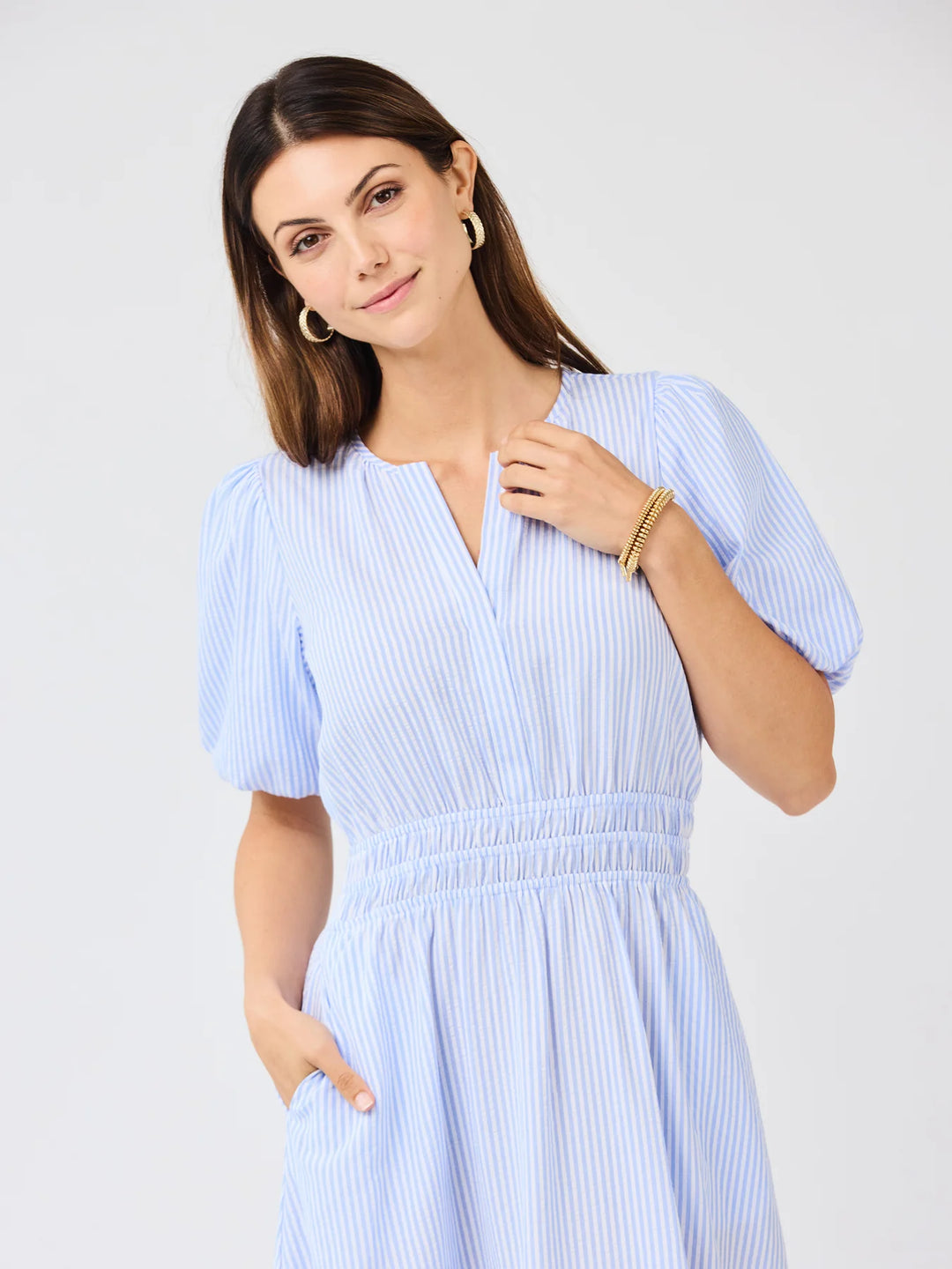Tracey Blue &amp; White Seersucker Dress with puff sleeves and tiered hem; available in sizes XS-XL.
