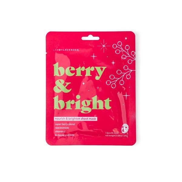 A red single-use “Let It Glow Holiday Face Masks” sheet mask package with green text and berry illustrations. Contains super berry blend, niacinamide, vitamin C, and aronia extracts. Made in Korea. Sizes available: single-use sheet mask.