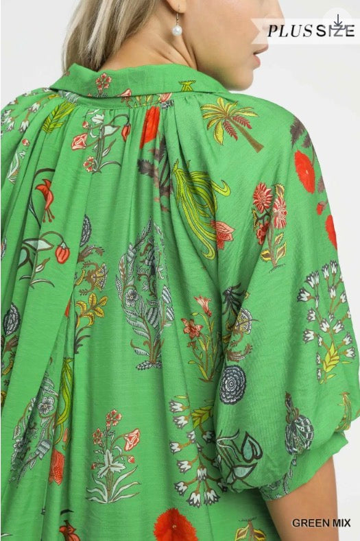 Floral Encyclopedia Print Mini Dress with green botanical pattern, colorful flowers, relaxed fit, puff sleeves. Sizes XS-XL.