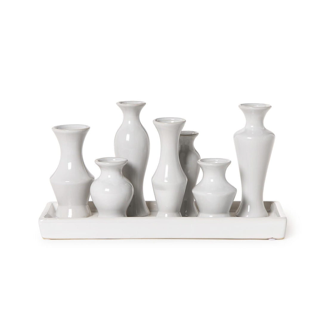 White Glaze Multi Vase with 7 sections; seven small, uniquely shaped white vases on a rectangular base. Sizes: Small, Medium.