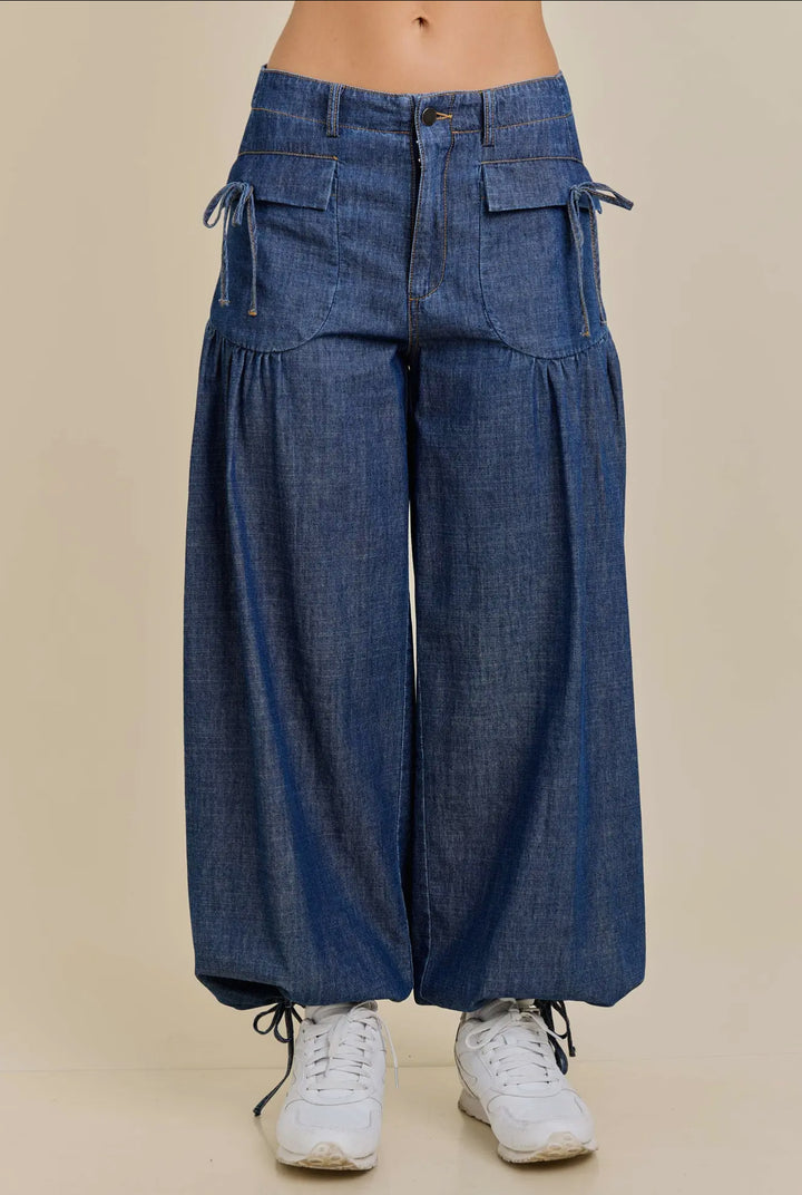 Dual-Style Wide-Leg Cinched Jogger with drawstring pockets and ankles. Available in sizes XS–XL.