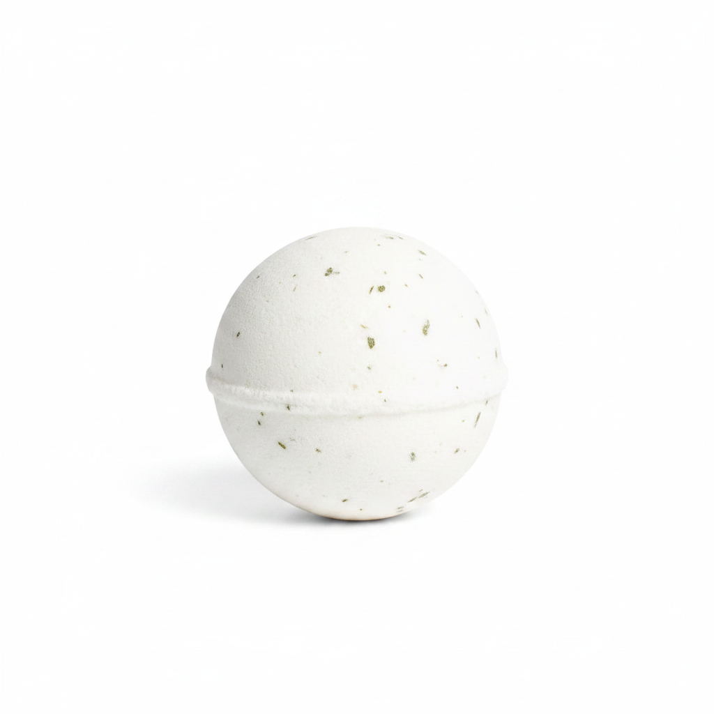 Spherical Winter Fir Bath Fizzer, Frosted Pine, white with green botanical pieces, fizzing in water.
