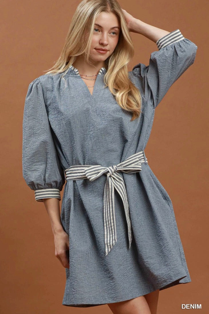 Contrast Tie Waist Mini Dress in blue, loose-fitting A-line with puffed sleeves and striped contrast tie waist belt. Available in sizes XS–L.