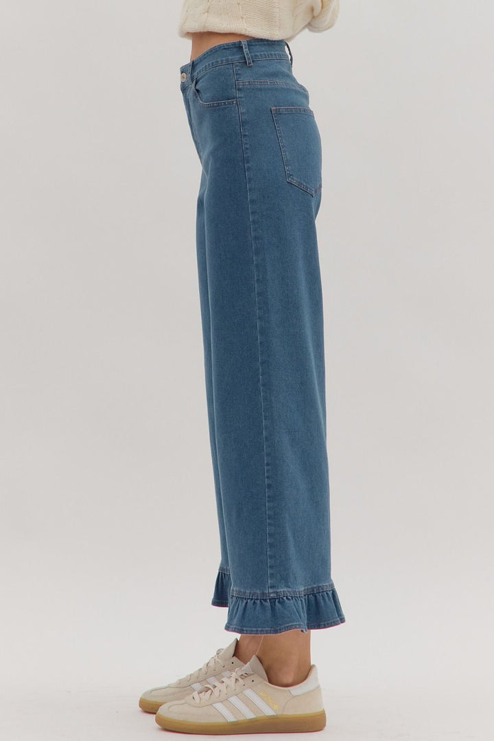 Leah Ruffle Trim Pants in blue with subtle ruffle details. Available in sizes XS–XL.