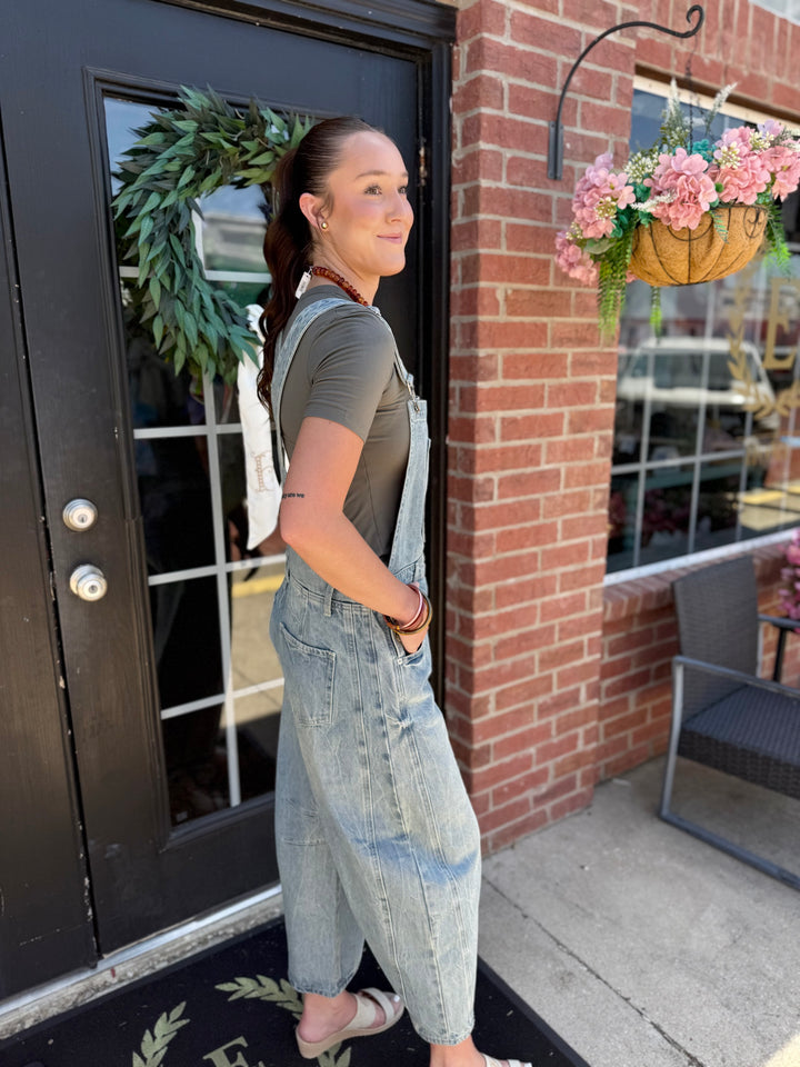 Dakota Mineral Wash Denim Jumpsuit, available in sizes S-XL.