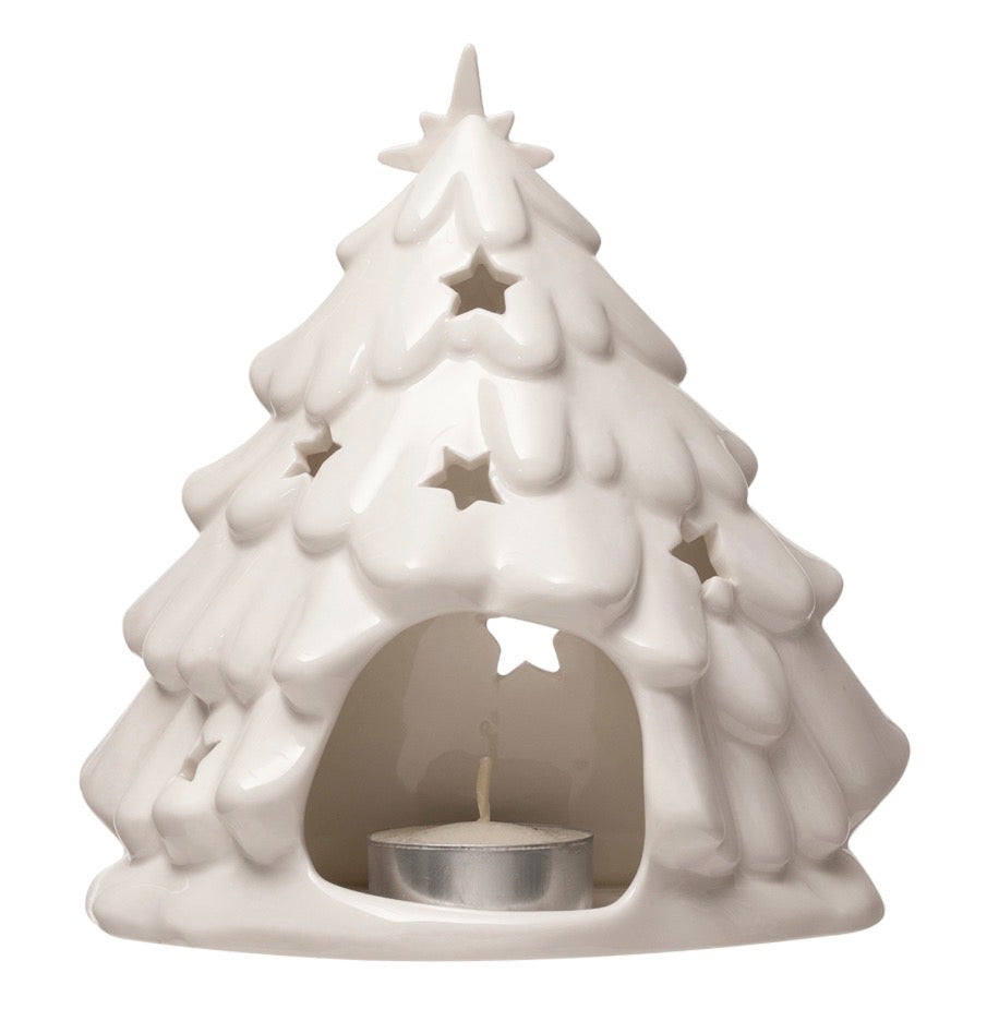 White stoneware Nativity Tree Candle Holder with star cutouts and tea light opening.