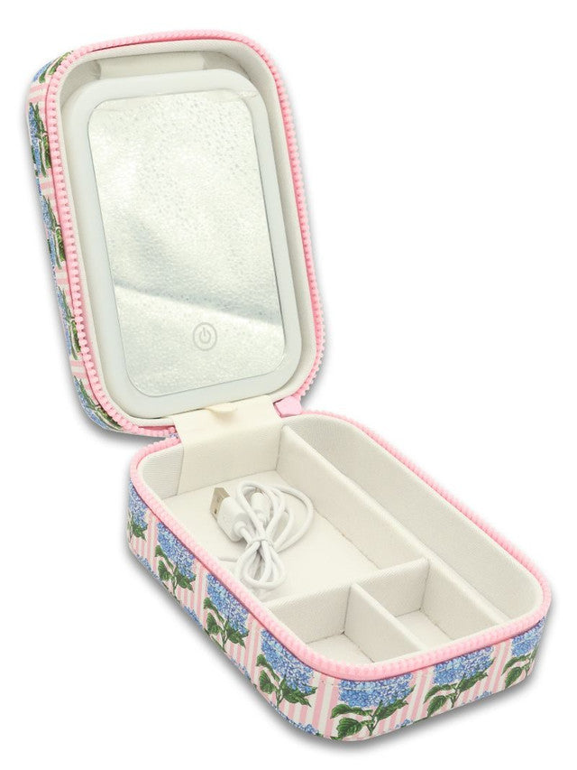 Compact floral jewelry case with mirror, elastic pouch, dividers, soft lining, charging cable. Sizes: small only.