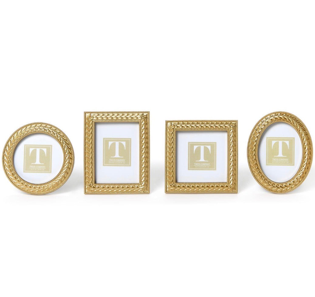 Set of four Laurel Wreath Gold Photo Frames: two round, one rectangular, and one oval, each with an ornate braided edge and white matting. Available sizes: 4x6", 5x7", 8x10".