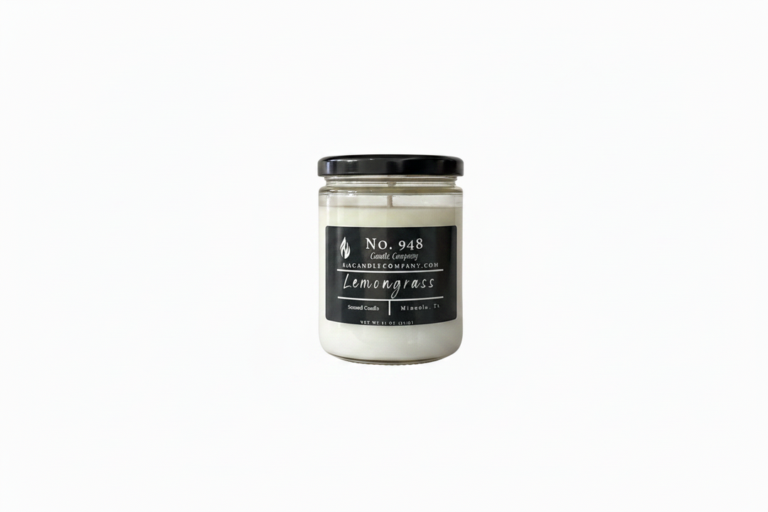 11 oz Lemongrass candle in a glass jar with black lid and “No. 948 Lemongrass” label; scented, white wax. Available size: 11 oz.