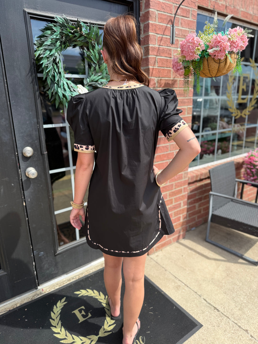 Wild Side Puff Sleeve Dress in black with patterned contrast trim on sleeves and hem; available in sizes XS–XL.