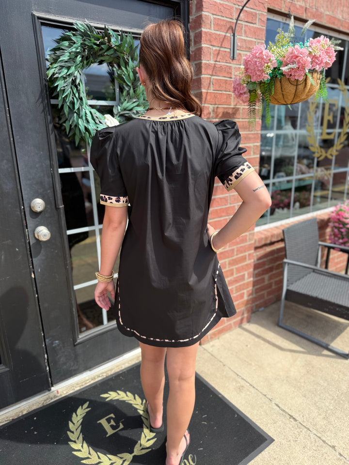 Wild Side Puff Sleeve Dress in black with patterned contrast trim on sleeves and hem; available in sizes XS–XL.
