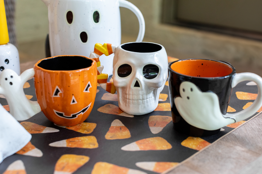 Set of three Halloween mugs (jack-o'-lantern, skull, ghost); available in 12 oz and 16 oz sizes.