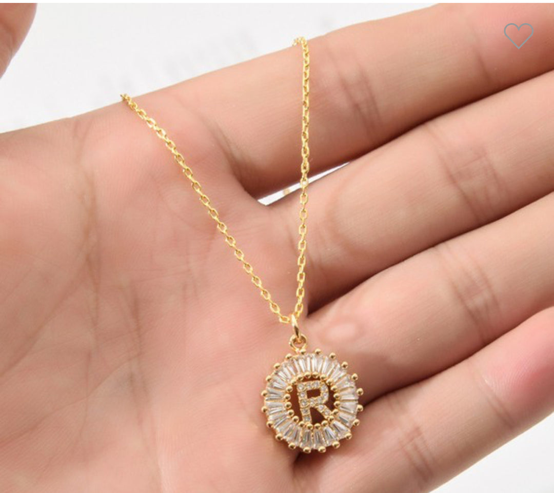 Stainless Steel Necklace with CZ Initial Pendant "R" encircled by cubic zirconia. Available in 16", 18", and 20" sizes.