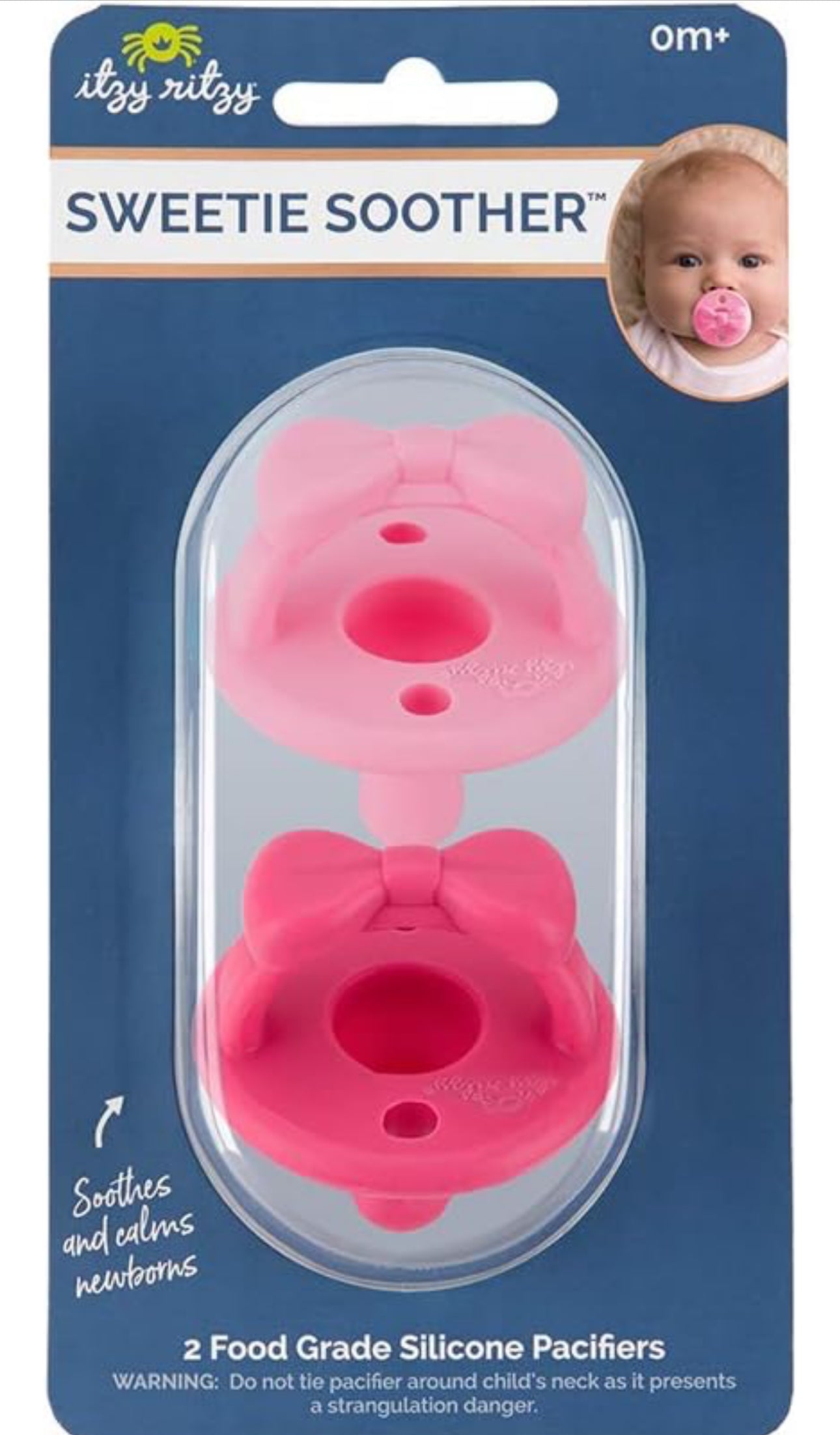 Packaging for Itzy Ritzy Sweetie Soother: Pink pacifiers, containing two pink, food-grade silicone, latex-free pacifiers designed for newborns, displayed in a clear blue blister pack.