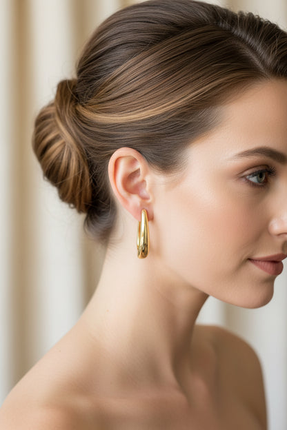 Hoop Earrings shown; available in small, medium, and large sizes.