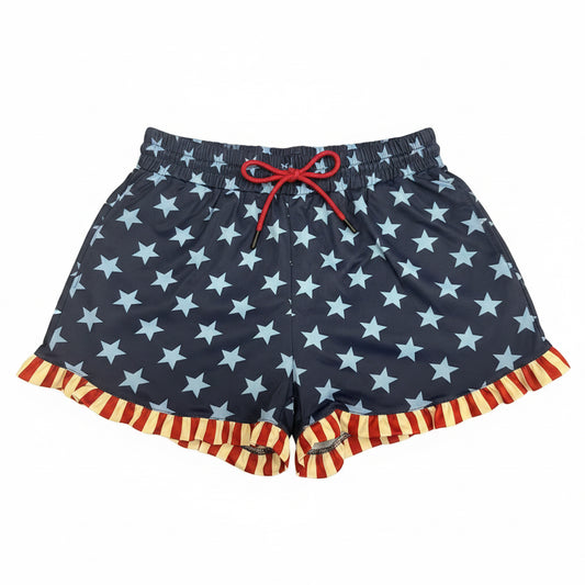 Navy blue shorts with light blue stars, red drawstring, red/yellow ruffles. Available in sizes XS-XL.