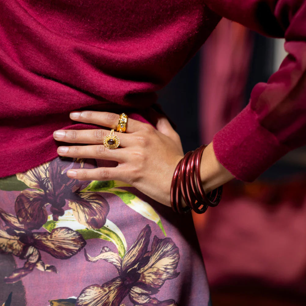 Handmade Merlot All Weather Bangles in maroon, available in sizes small, medium, and large.