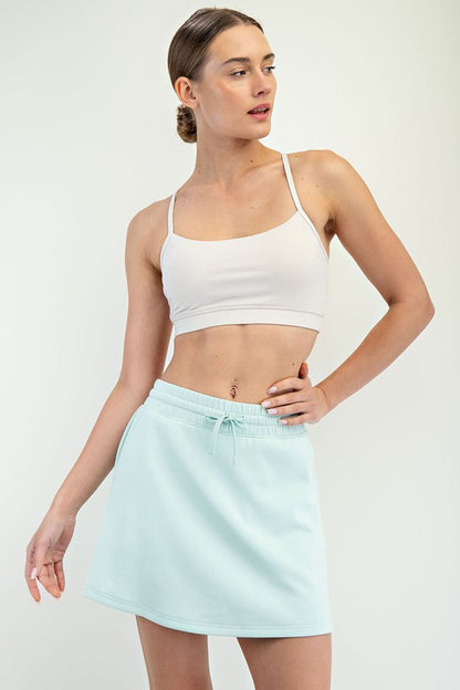 Light blue Modal Scuba Skort, available in sizes XS to XL.