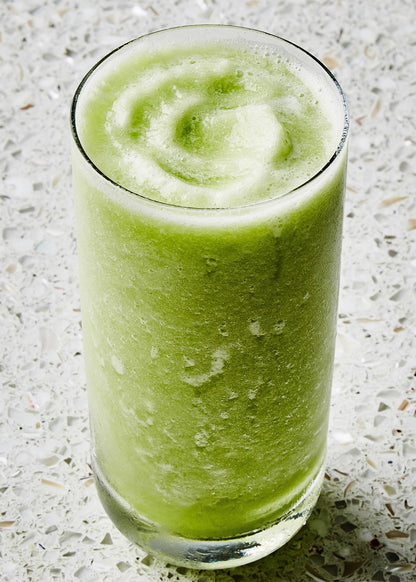 Thick, light green smoothie with a swirled top made from Wine & Cocktail Slush Mix Bags. Available in 8oz and 16oz sizes.