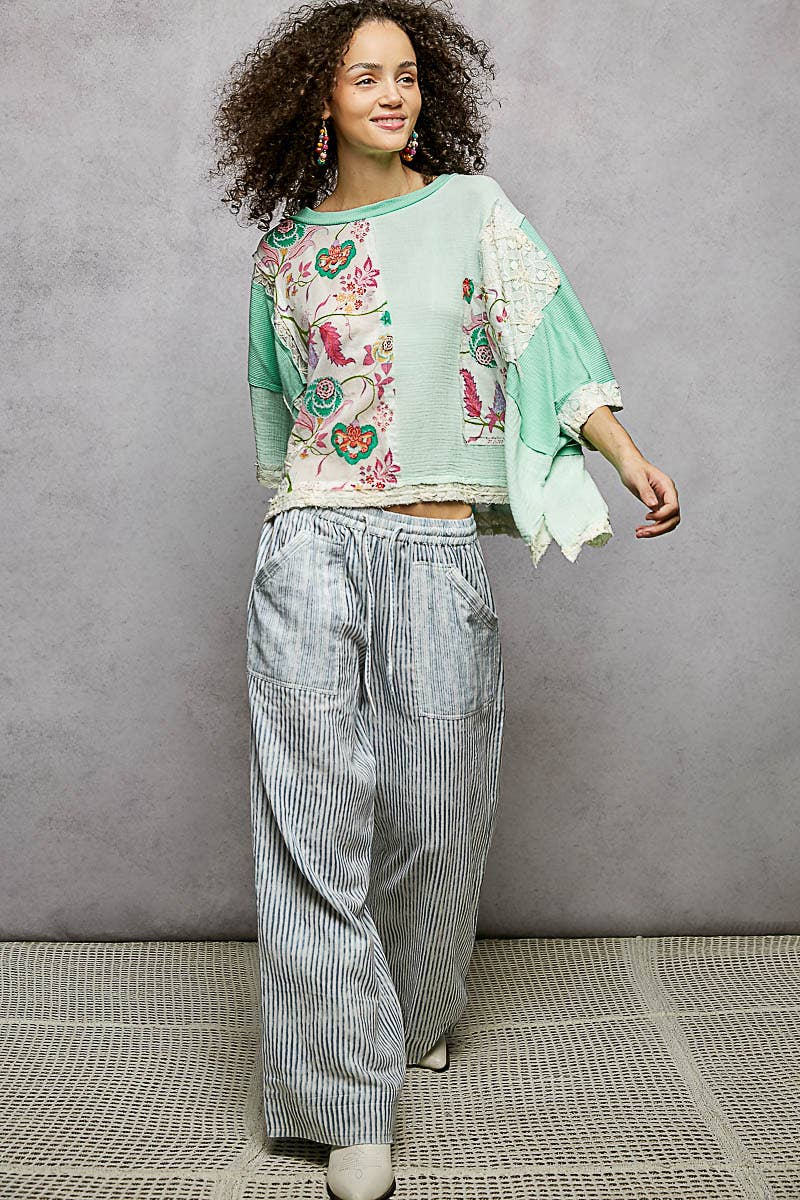 Round Neck Double Gauze Floral Woven Top in mint green. Available in sizes XS-XL.