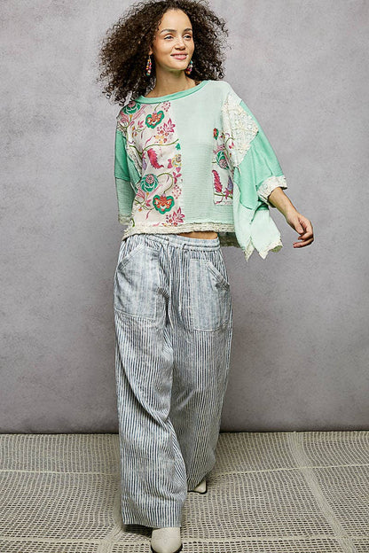Round Neck Double Gauze Floral Woven Top in mint green. Available in sizes XS-XL.