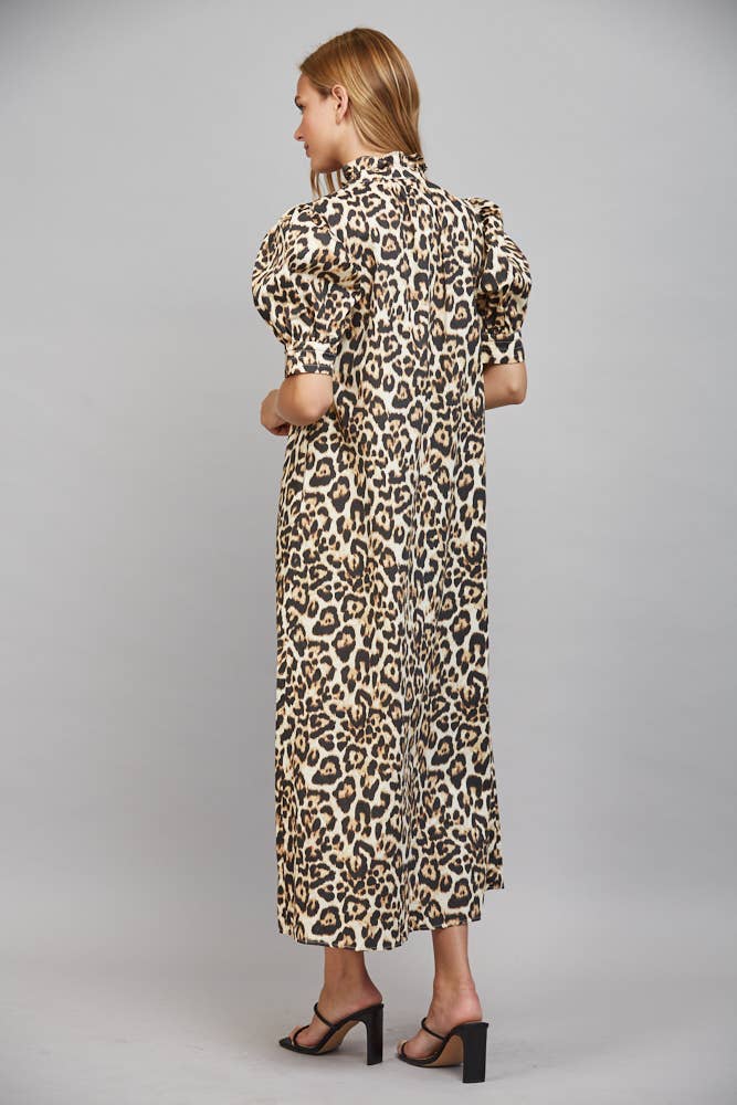 Ivory multi animal print midi dress with a ruffled high neckline, button-down front, and short puff sleeves. Available in size M.