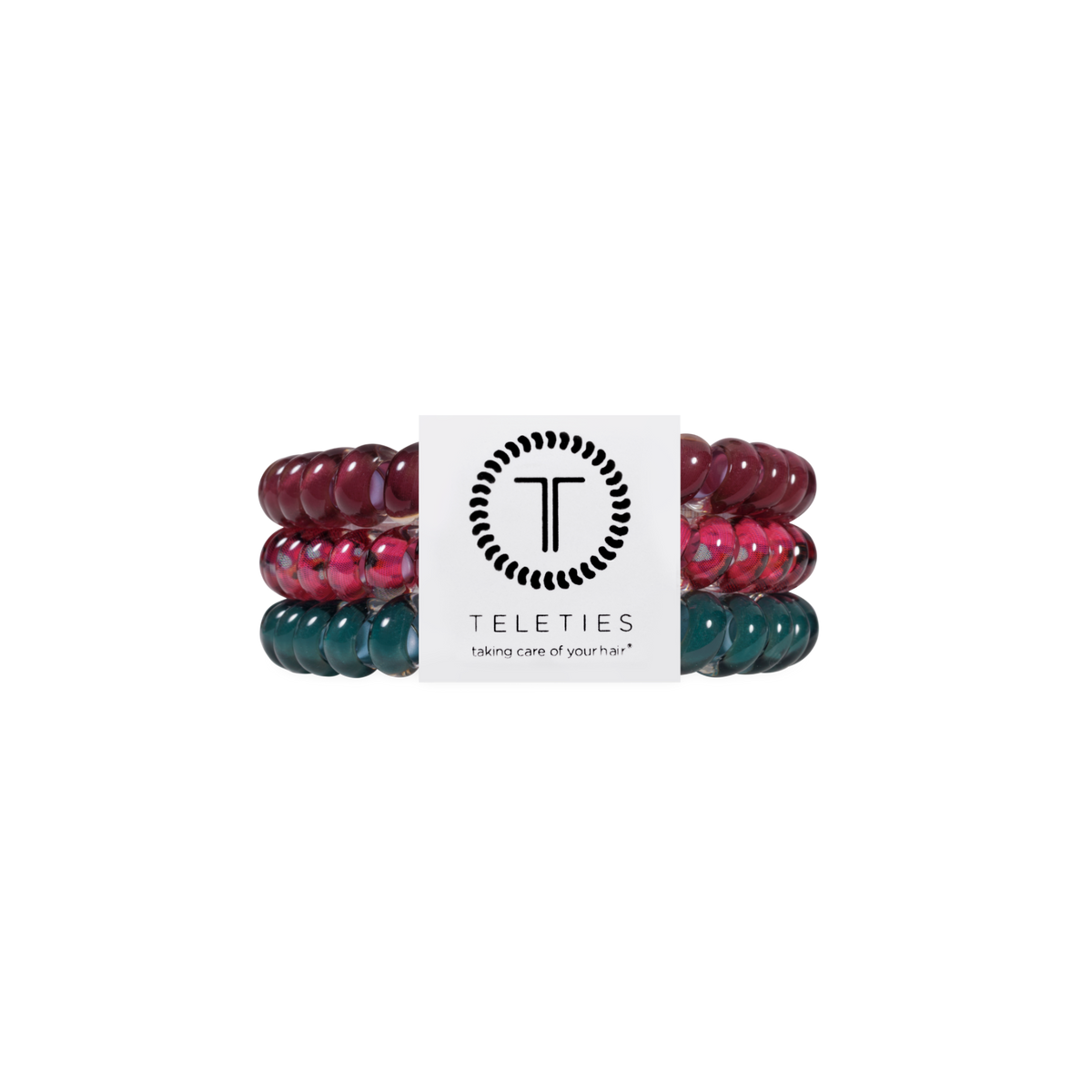 Set of three Harvest Hues Small Hair Ties in maroon, pink, and teal with a white TELETIES brand card displaying the logo and “taking care of your hair” slogan. Available in small size.
