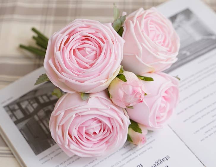 A bouquet of five light pink Real Touch roses, resembling a 6-stem bundle. Available in one size.