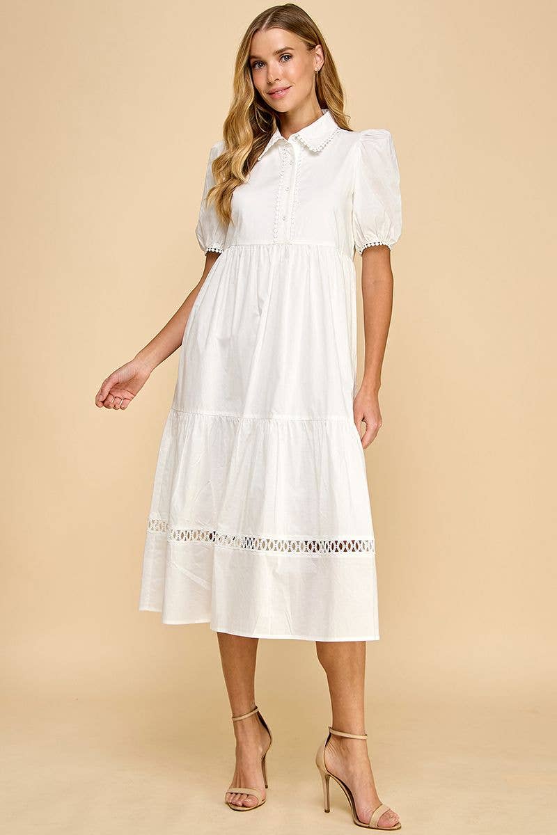 White button-up collared midi dress with contrast trim and short sleeves. Available in sizes XS-XL.