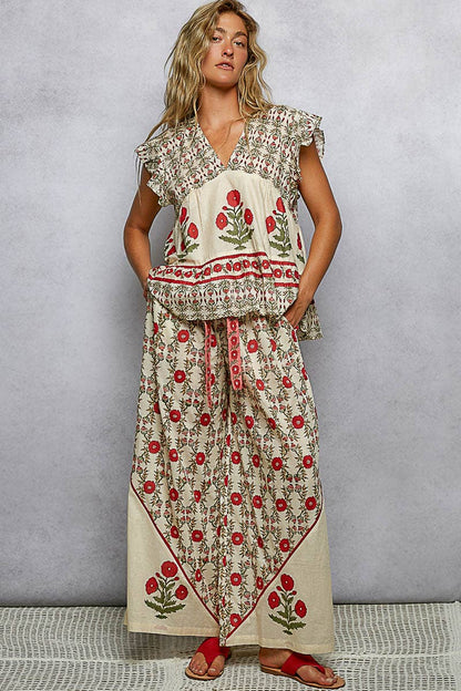 Ruffle sleeve V-neck floral top, red floral wide-leg pants. Available sizes: XS-XL.