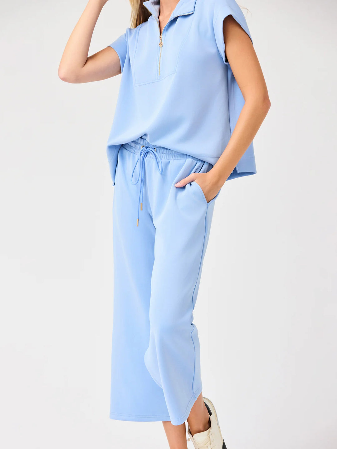 Light blue Sabrina Cropped Pants in CloudSilk with elastic drawstring waist; available in sizes XS-XL.
