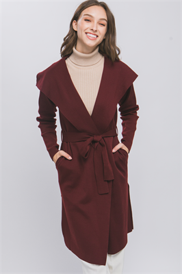 The Open Knit Coat with Ribbon Waist in burgundy features a classy design with a wide collar and includes pockets. Sizes available: XS, S, M, L, XL.