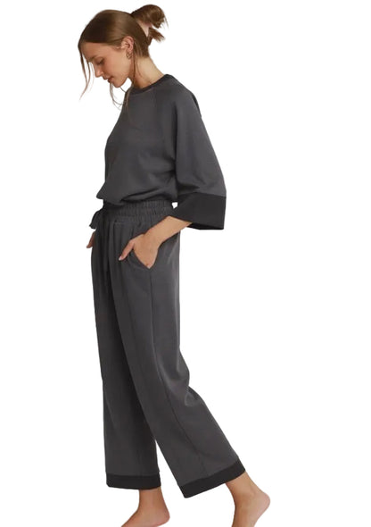 Charcoal Colorblock Straight Pants made from eco-friendly CloudKnit fabric, featuring a loose fit, cuffed hem, and pockets. Available in sizes XS–XL.
