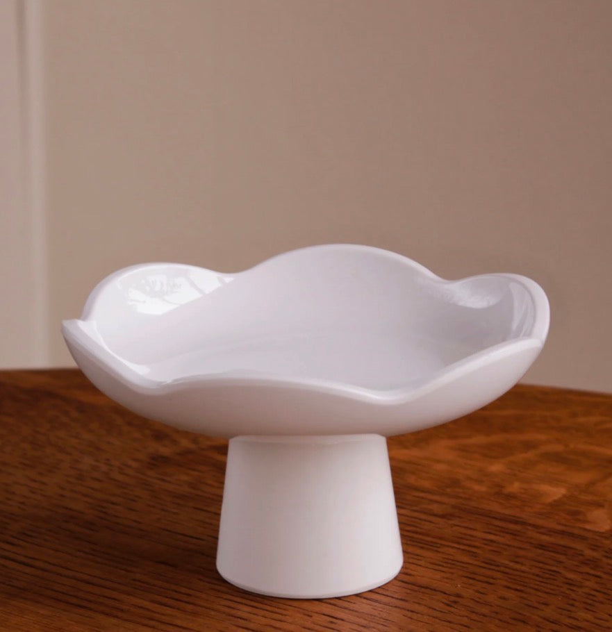 White ceramic small pedestal with wavy edge; available in multiple sizes.