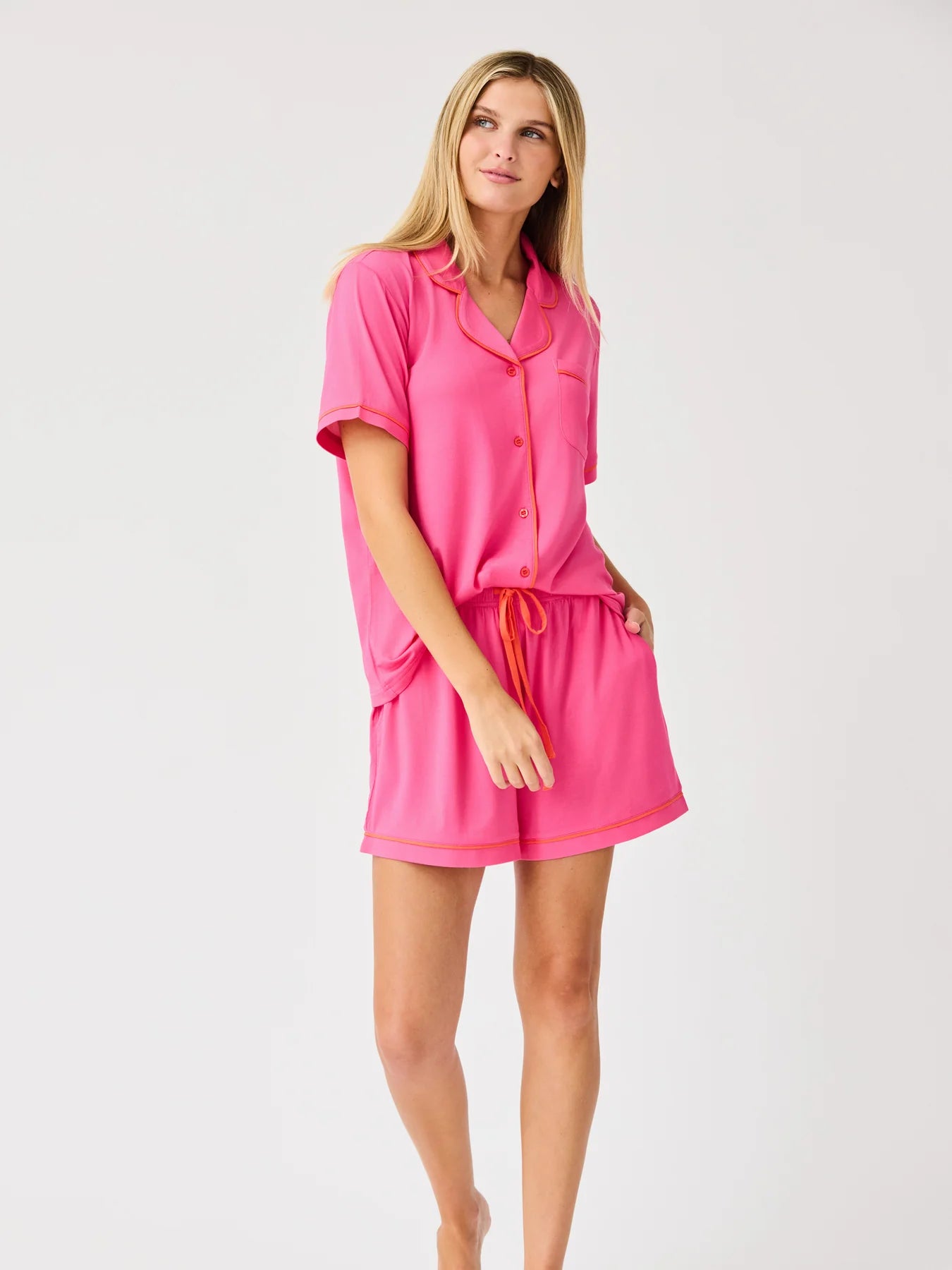 Charlotte Pink Shorts Set: bright pink, orange piping, short-sleeve top, drawstring waist shorts. Sizes XS-XL.